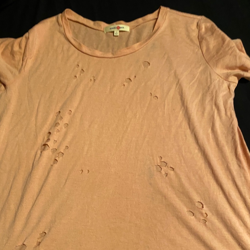 Ripped orange shirt